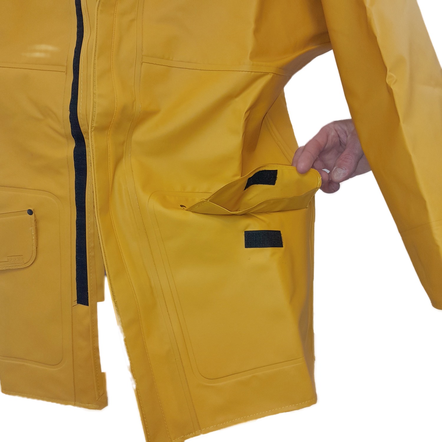 Détail poches étanches sous double rabat auto-agrippant